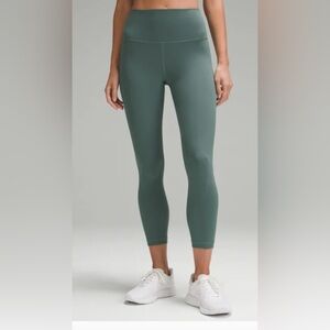 Lululemon Wunder Train High-Rise Crop 23" in color Medium Forest